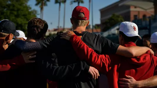 Team huddle at Marks Stadium
