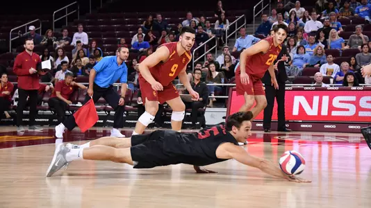 Matt Douglas dives to the ground and pancakes the ball.