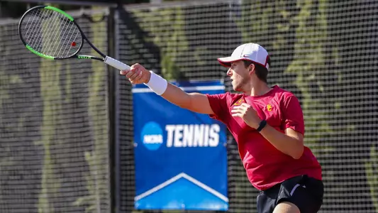 Brandon Holt takes a swing in an NCAA dual match at Marks Stadium.