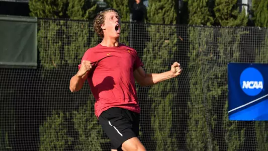 Riley smith celebrates the clinching win in USC's NCAA Second Round win over USD.