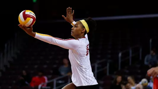 Khalia Lanier serves the volleyball