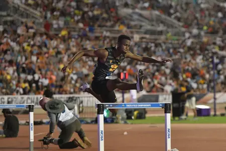 Cameron Samuel in 400m hurdles final