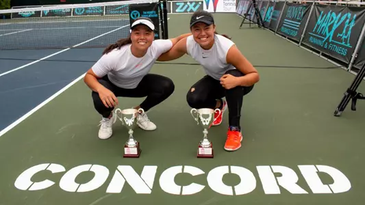 Angela Kulikov and Rianna Vales with their trophies after winning the Thoreau Open