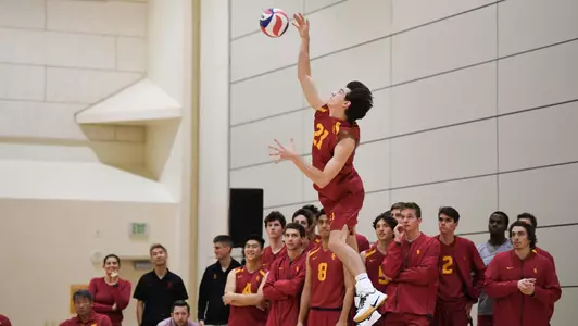 Adam Flood jump serves in the Galen Center Pavilion.