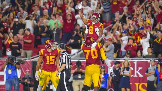 USC Trojans receiver Amon-Ra St. Brown celebrates with teammates