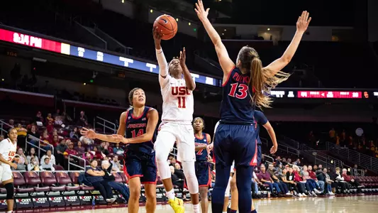 Aliyah Jeune takes it to the hoop against Arizona at Galen Center