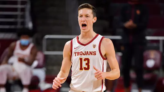 USC Trojans Basketball forward Drew Peterson celebrates