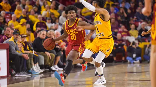 Ethan Anderson drives against ASU