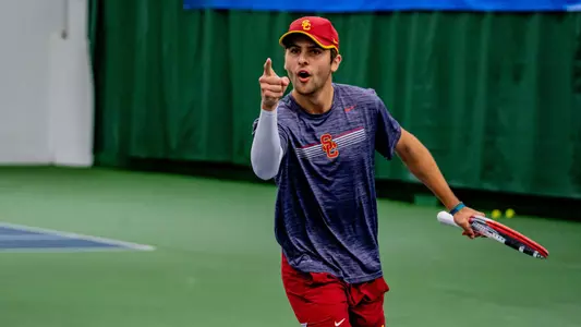 Stefan Dostanic points at a teammate during a win at ITA National Team Indoors.
