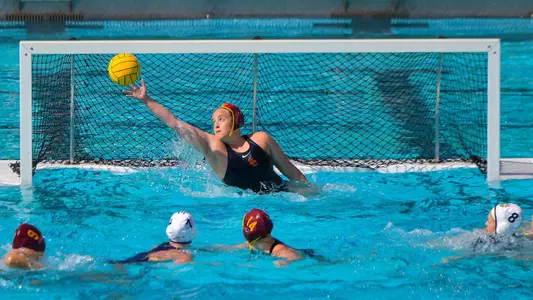 Holly Parker stretches for a save vs. UC Irvine at Uytengsu Aquatics Center
