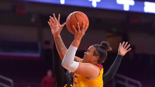 Kayla Overbeck takes it to the hoop at Galen Center