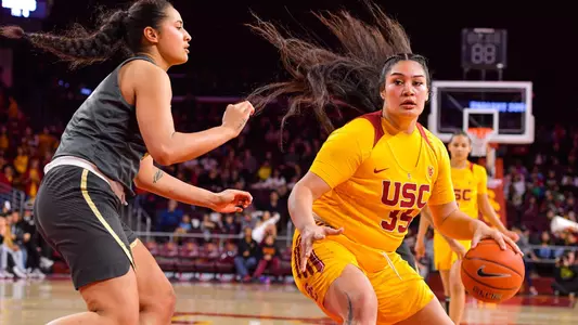 Alissa Pili preps for a spin move on a defender in USC's win over Colorado at Galen Center.