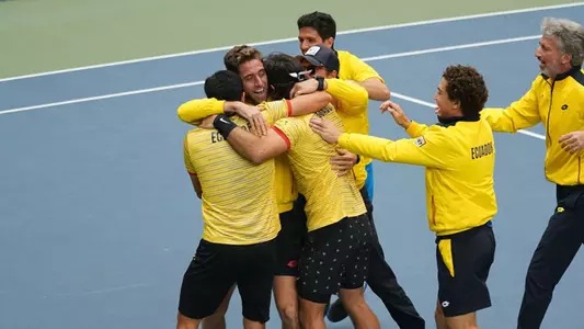 Former Trojans Roberto Quiroz and Emilio Gomez celebrate a Davis Cup win for Ecuador