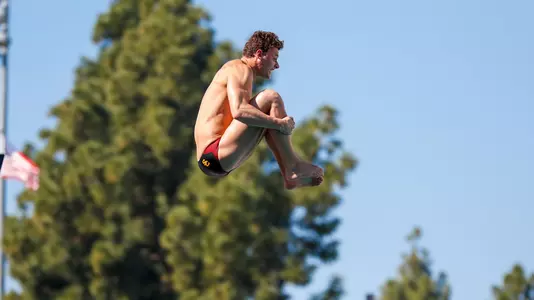 Henry Fusaro diving during dual meet against Stanford.