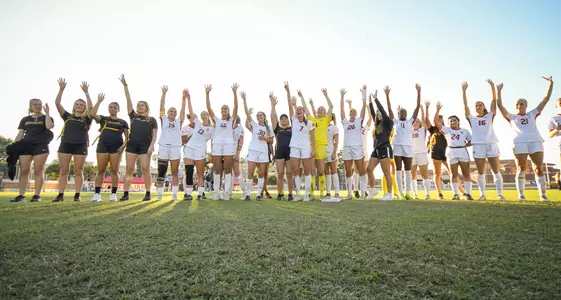 Soccer team salutes crowd