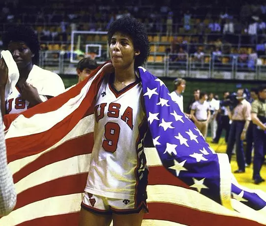 Cheryl Miller with USA Flag