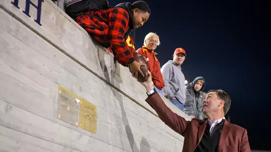USC Trojans athletic director Mike Bohn with fans
