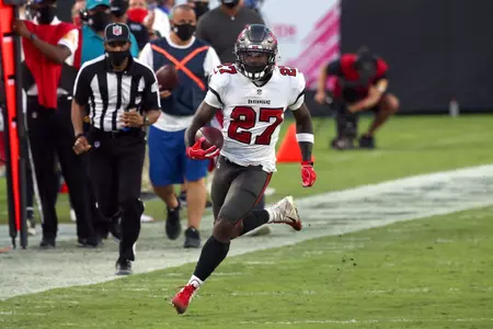 Ronald Jones II wearing white Buccaneers jersey