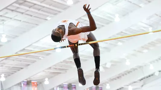Earnest Sears III over the bar indoors