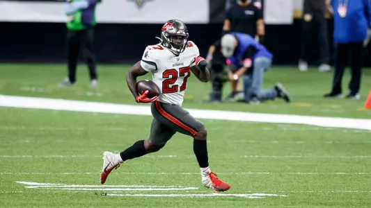 Ronald Jones II wearing white Buccaneers jersey