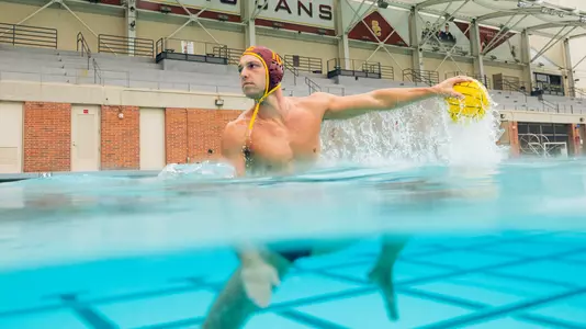 Marcus Longton rises out of the water for a shot during a photo shoot at Uytengsu Aquatics Center