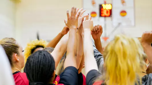 USC players huddle up at a practice at Galen Center