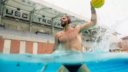 Ashworth Molthen takes aim during a photo shoot at Uytengsu Aquatics Center.