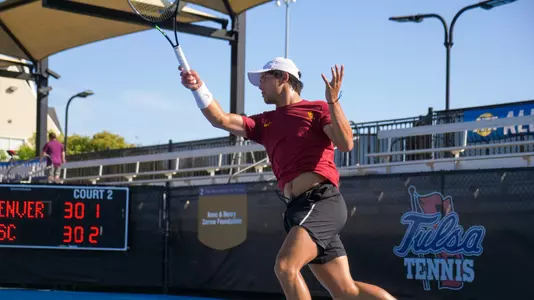 Bradley Frye rips a forehand during the doubles quarterfinal at the ITA All-American