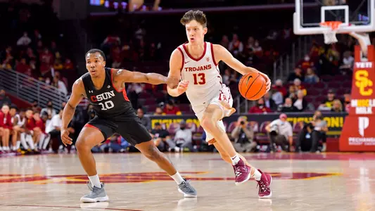 Drew Peterson dribbles upcourt