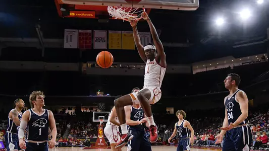 USC Trojans Basketball forward Chevez Goodwin dunks against Dixie State