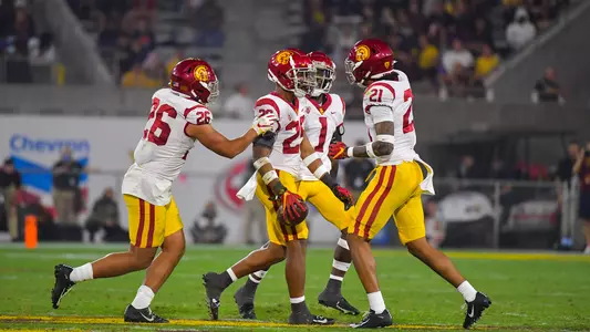 USC Trojans Football safety Xavion Alford celebrates with defense