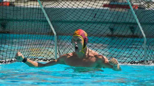 Goalie Nic Porter cheers during a game  at Uytengsu Aquatics Center