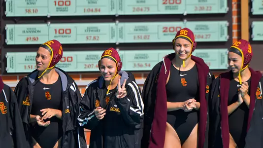 Bayley Weber, Verica Bakoc and Denise Mammolito are lined up on the deck for pregame team introductions