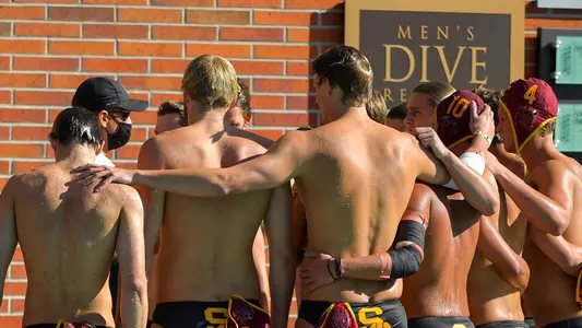 USC team huddles up before a game at Uytengsu Aquatics Center