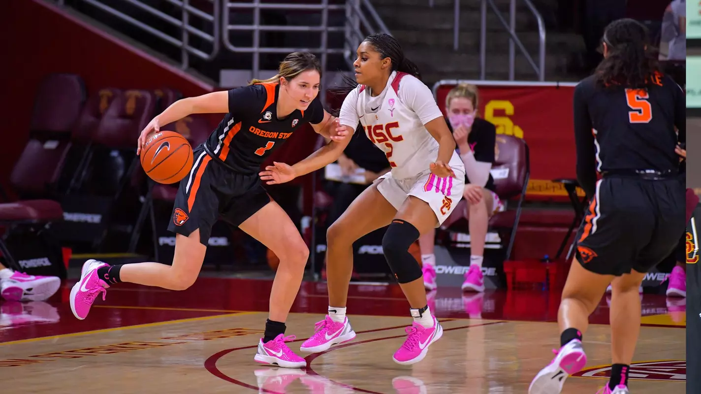 Desiree Caldwell defends an OSU guard at Galen Center