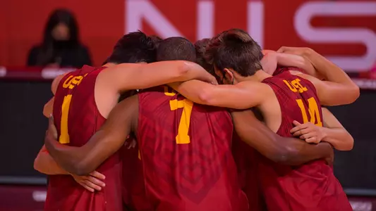 Trojans huddle between points