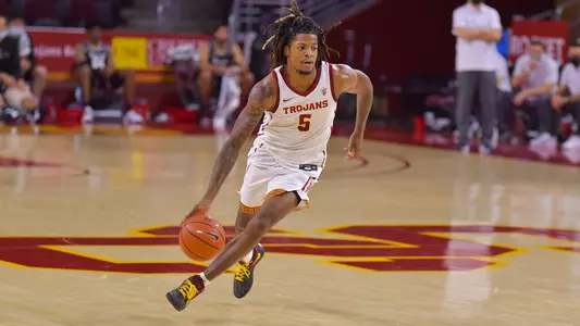 Isaiah White dribbling