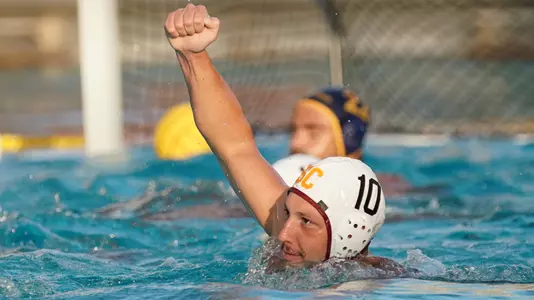 Marcus Longton cheers after a big goal scored in USC's 12-10 win over Cal in the NCAA semis.