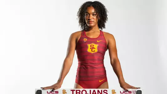 Jasmine Jones posed with a hurdle