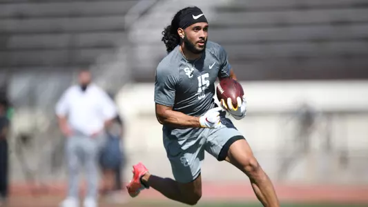 Talanoa Hufanga catches a ball at USC Trojans Football's Pro Day