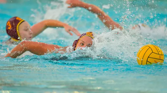 Verica Bakoc swims with the ball in a game at Uytengsu Aquatics Center.
