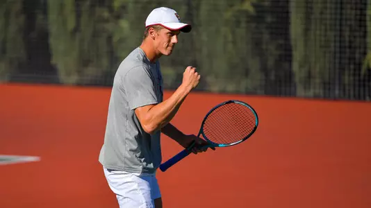 Riley Smith cheers a point won at Marks Stadium