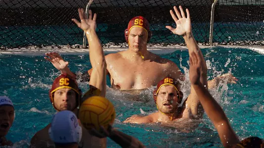 USC goalie Nic Porter and field players Jacob Mercep and Jake Ehrhardt defend against a UCLA shooter