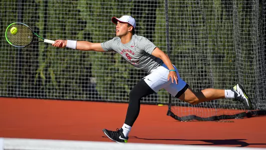 Bradley Frye stretches for a return in a match at Marks Stadium