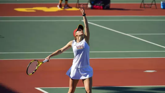 Summer Dvorak serves the ball.