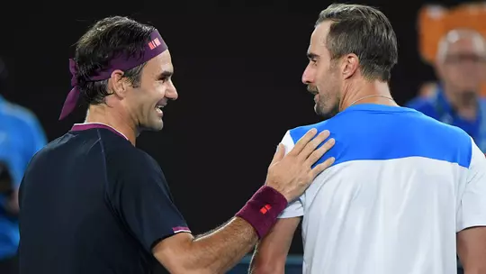 Steve Johnson and Roger Federer