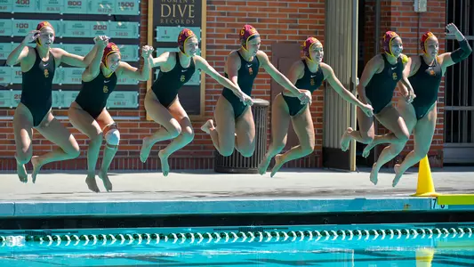 USC's starters jump into the pool before a win over Stanford at Uytengsu Aquatics Center.