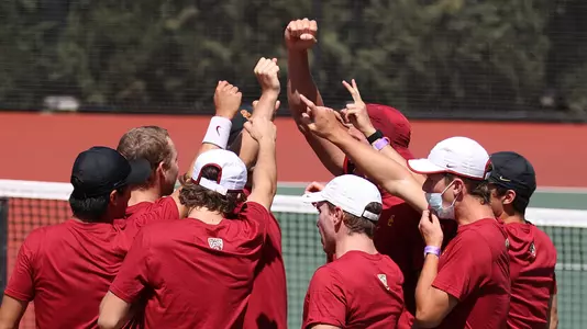 The USC team huddles up for a cheer before a match at Marks Stadium