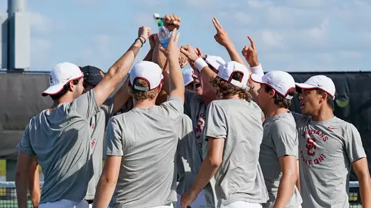 USC team huddles up before its NCAA Quarterfinal match in Orlando