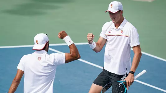 Daniel Cukierman and Riley Smith celebrate a point won during the NCAA Tournament